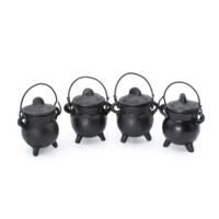Four extra-small cast iron cauldrons